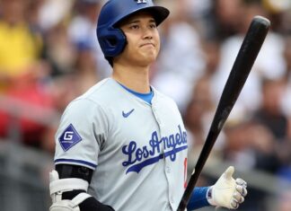 Dodgers remove Shohei Ohtani after ‘his back tightened up’