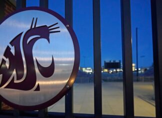 Washington State removed interim tag, named Anne McCoy AD