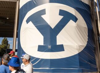 College Football 25 cover leads to fights between football fans – Deseret News