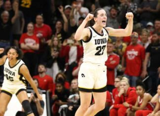 Hawkeye star builds on NCAA record