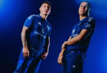 Manchester United unveil 90s-inspired dark blue away kit