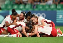 Defiant Canada keep faint Olympic hopes alive amid spy scandal