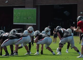NFL teams using videoboards for real-time analysis at practice