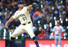 Brewers call up reliever Kevin Herget, DFA Enoli Paredes