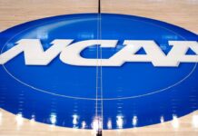 Settlement designed to pay college athletes gets preliminary approval