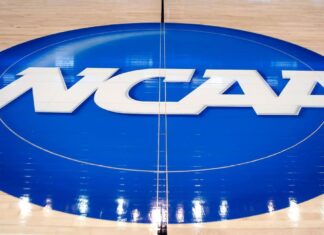 Settlement designed to pay college athletes gets preliminary approval