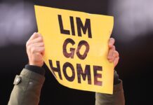 Singapore seizes Valencia fans’ passports over owner protest