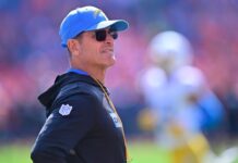 Chargers’ Jim Harbaugh briefly exits vs. Broncos with illness