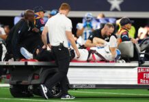 Lions’ Aidan Hutchinson carted off with apparent serious leg injury