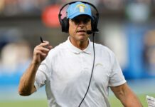 Chargers’ Jim Harbaugh ‘confident’ heart condition under control